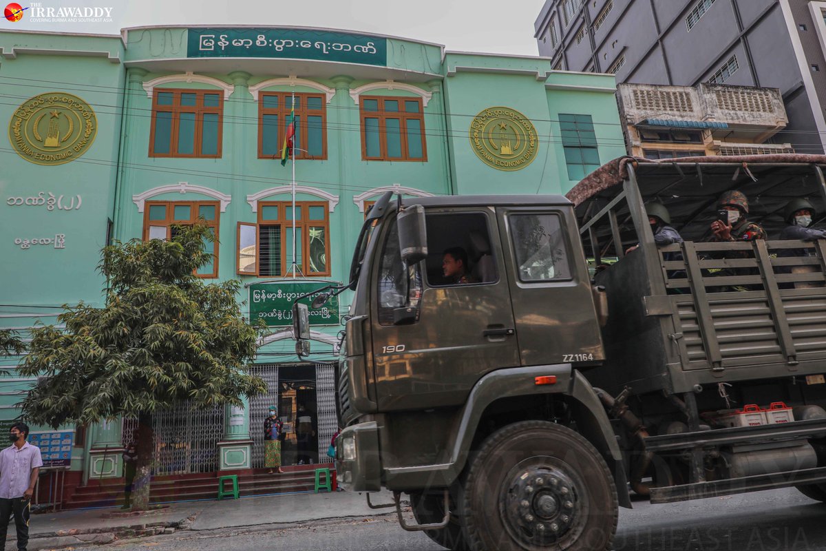 Anti_coup protesters filled the streets of Mandalay on Monday, standing in front of government offices and banks and urging staff to join the #CivilDisobedienceMovement, despite the presence of troops. (Photo: The Irrawaddy) 