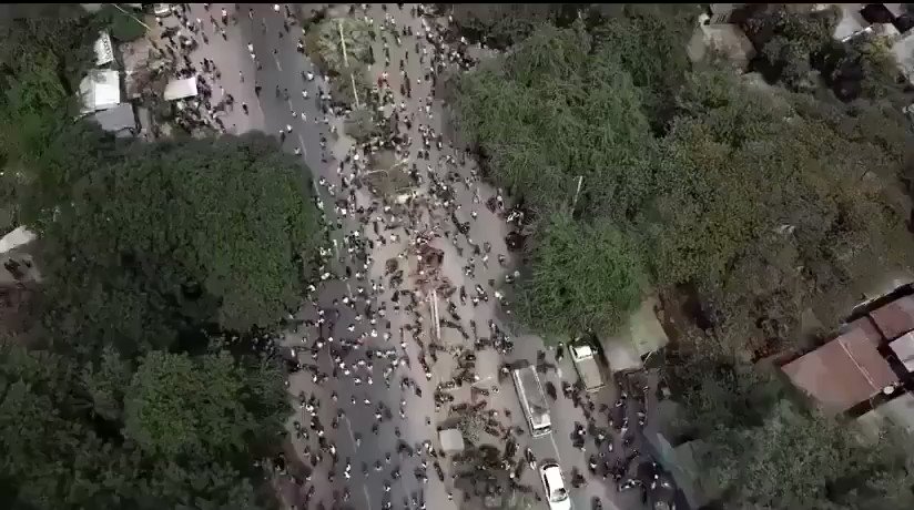 Geolocation of drone footage which appears to show security forces dispersing protesters in Mandalay, Myanmar.   Two people were killed earlier today when security forces opened fire with live rounds.   