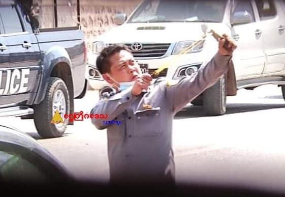 Police shooting the citizens with sling.  Location: Taunggyi, Myanmar 
