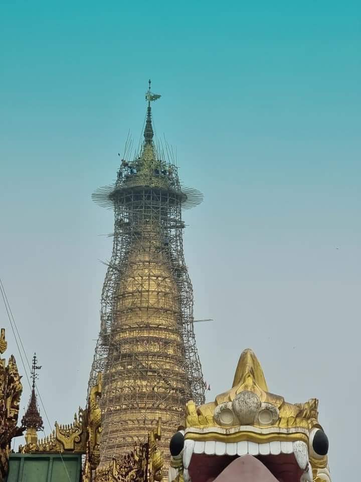 Shwedagon Pagoda is scaffolding till holy umbrella which enshrined with many precious jewels . Locals who live near pagoda since they born says they had never seen scaffolding till holy umbrella before — photos are taken today (3.4.2021)