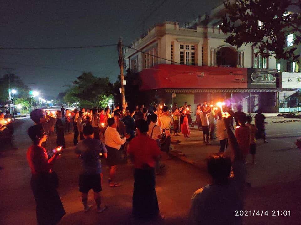 Civillians gathered around and held a candlelight night protest in PyiGyiTaGon, Mandalay