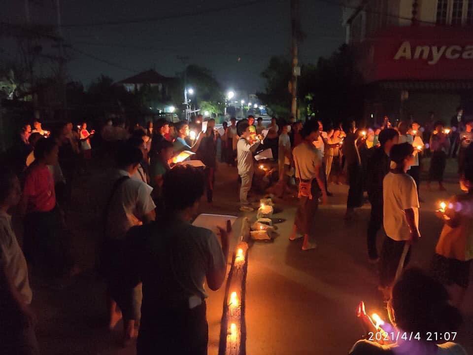 Civillians gathered around and held a candlelight night protest in PyiGyiTaGon, Mandalay