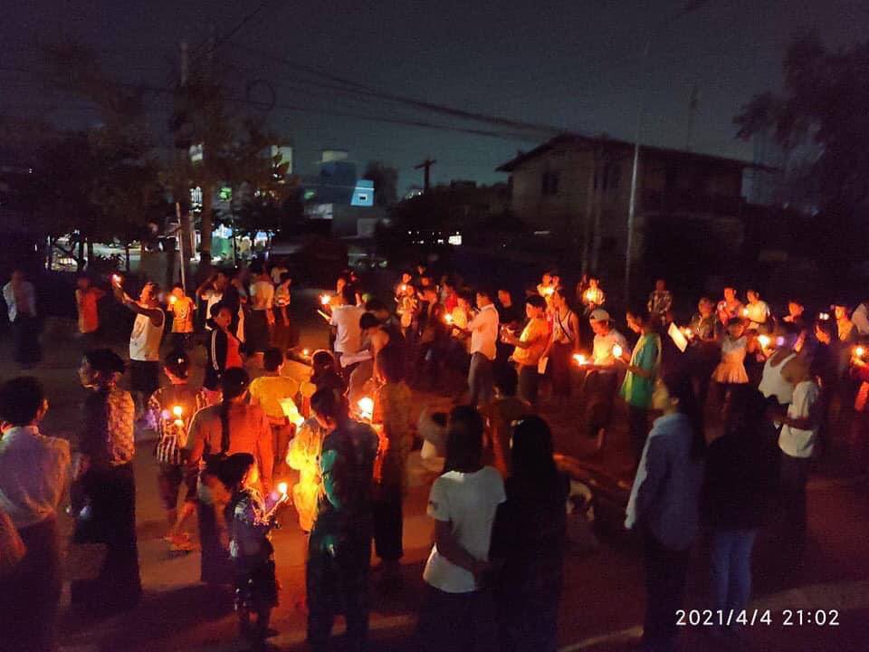 Civillians gathered around and held a candlelight night protest in PyiGyiTaGon, Mandalay