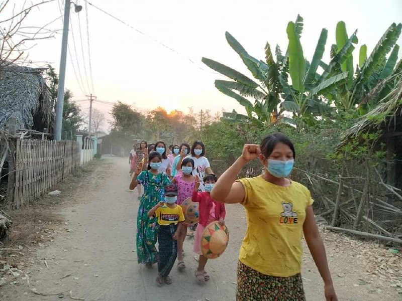 An evening of anti-regime protests in a village in Yinmarpin, Rangoon. March 12: In a village in Yinmarpin, a mass demonstration against the dictatorship takes place on March 12.