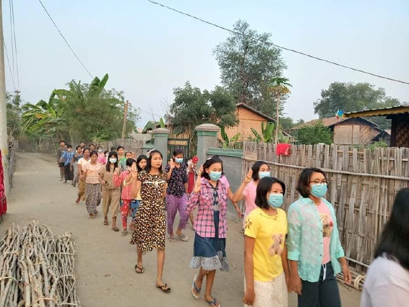 An evening of anti-regime protests in a village in Yinmarpin, Rangoon. March 12: In a village in Yinmarpin, a mass demonstration against the dictatorship takes place on March 12.