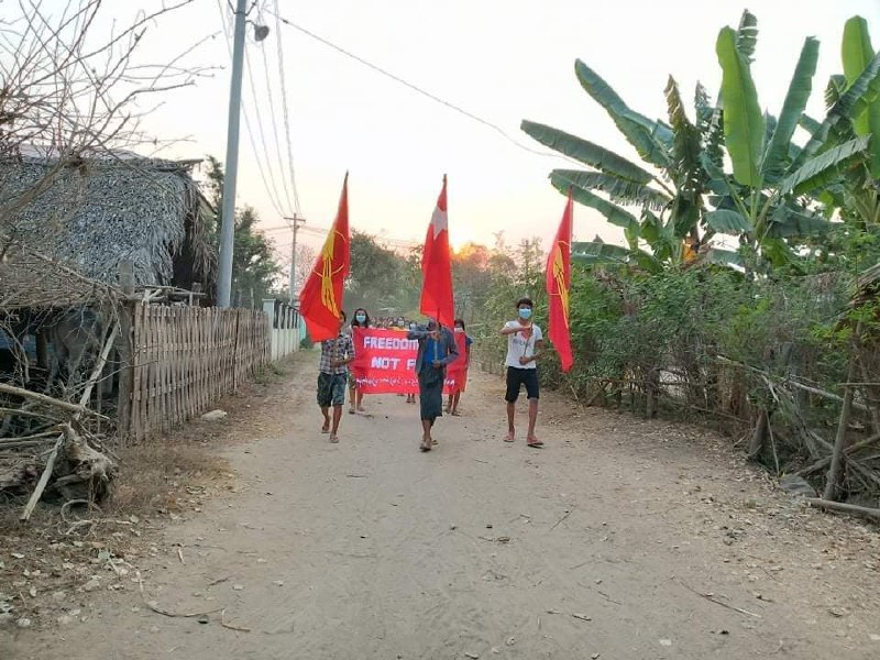 An evening of anti-regime protests in a village in Yinmarpin, Rangoon. March 12: In a village in Yinmarpin, a mass demonstration against the dictatorship takes place on March 12.