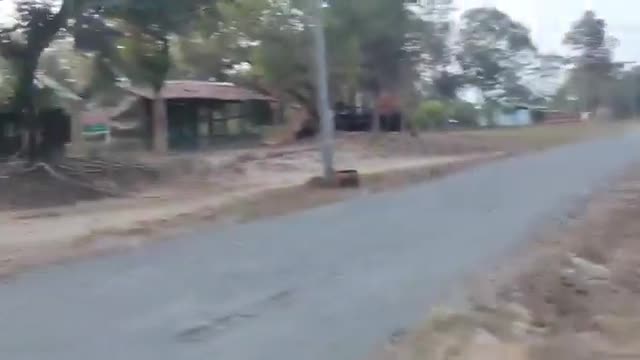 Myanmar: KIA and PDF resistance forces continue to advance in the city of Bhamo in southern Kachin state.A burned out junta vehicle can be seen by the side of the road