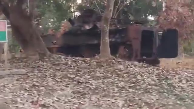 Myanmar: KIA and PDF resistance forces continue to advance in the city of Bhamo in southern Kachin state.A burned out junta vehicle can be seen by the side of the road